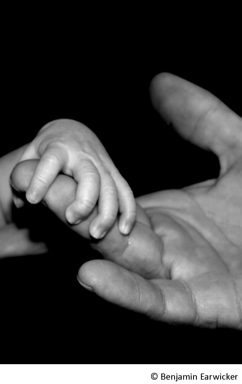 dad and baby hands incl copyright